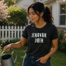 Woman wearing black "Jehovah Jireh" graphic t-shirt outdoors